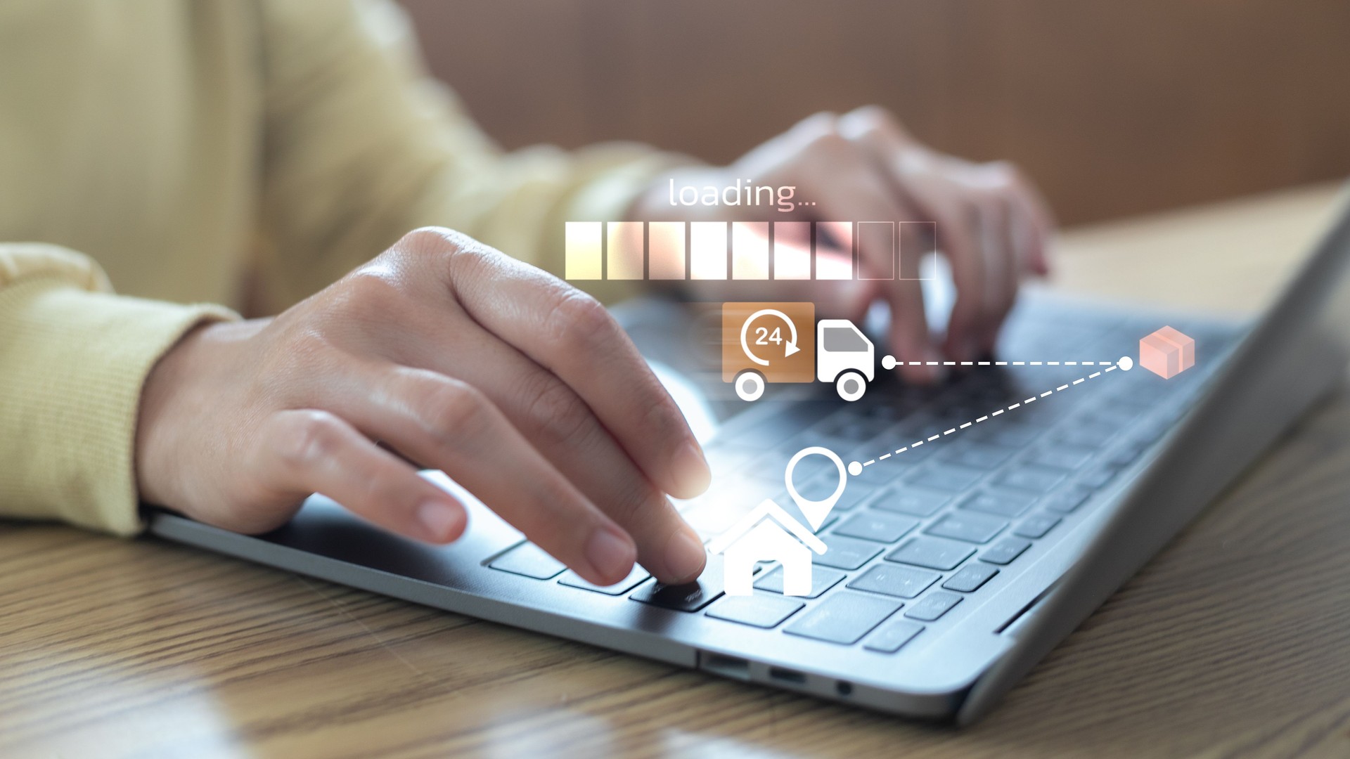 Close-up of hands typing on a laptop with digital icons of express delivery, same-day shipping, real-time package tracking, and 24-hour logistics service for e-commerce business solutions.